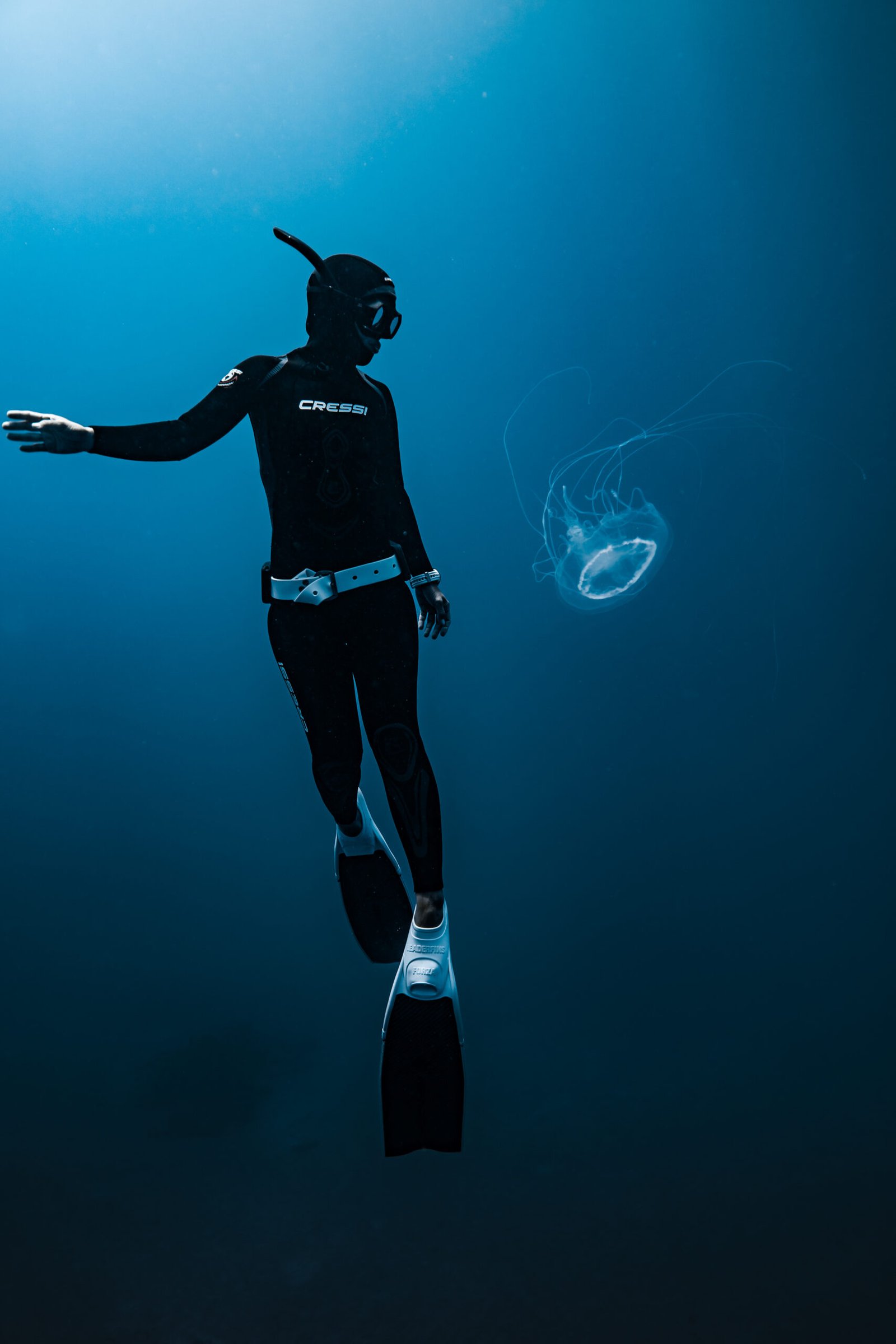 Freediver with jellyfish