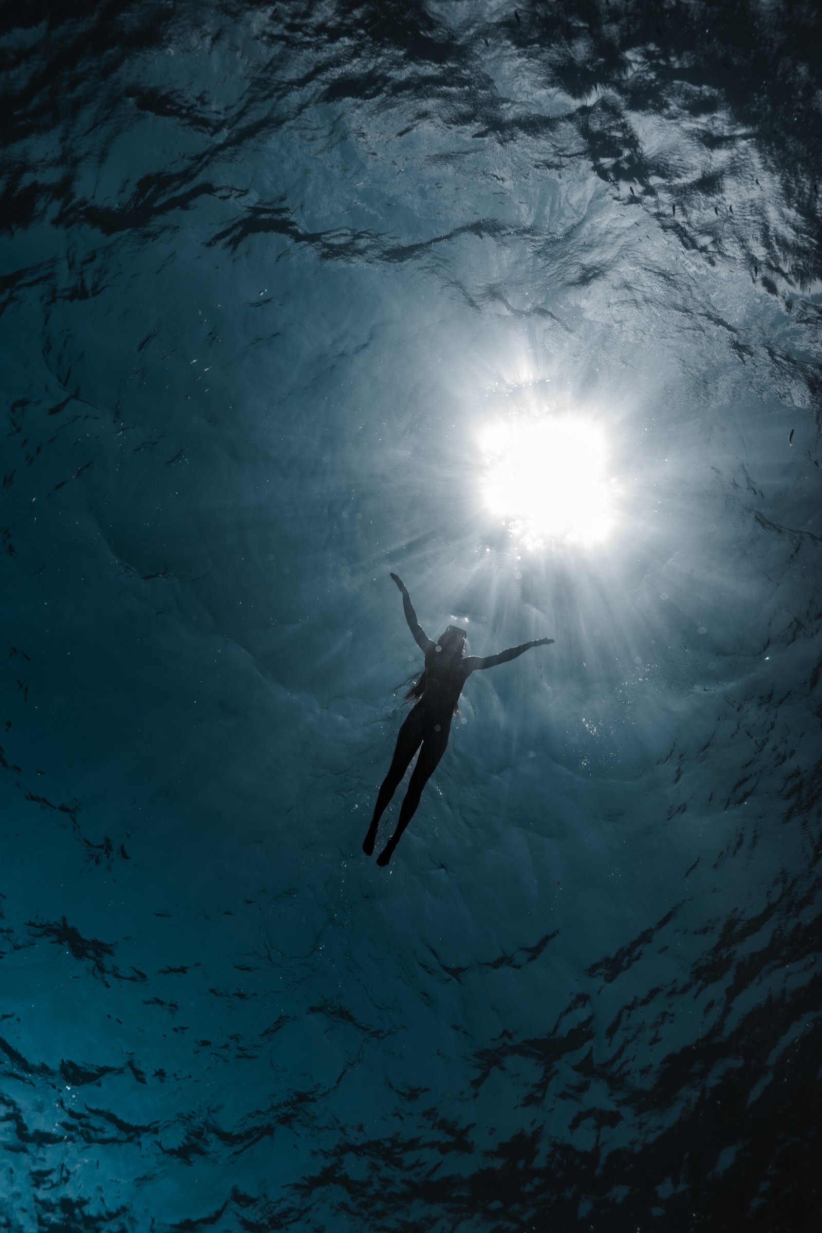 Artistic freediving photograph by Alessio Sera